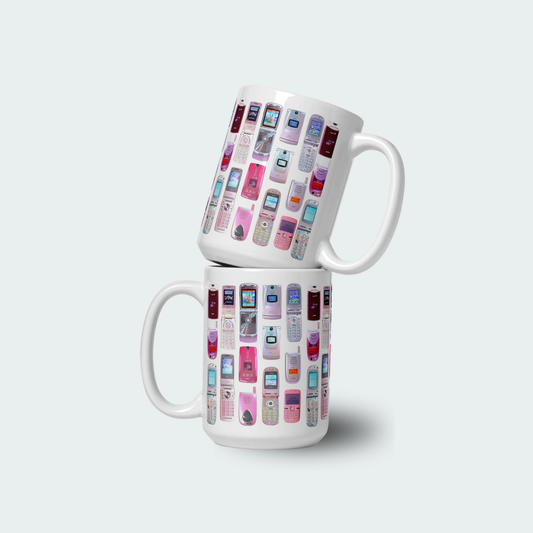 Two stacked mugs with vintage phone design on a white background