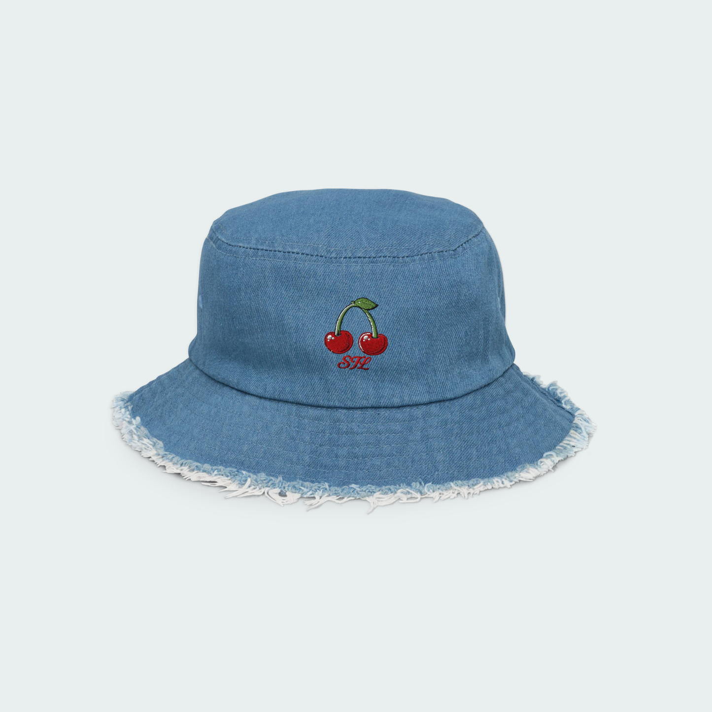 Blue denim bucket hat with cherry embroidery on a light gray background
