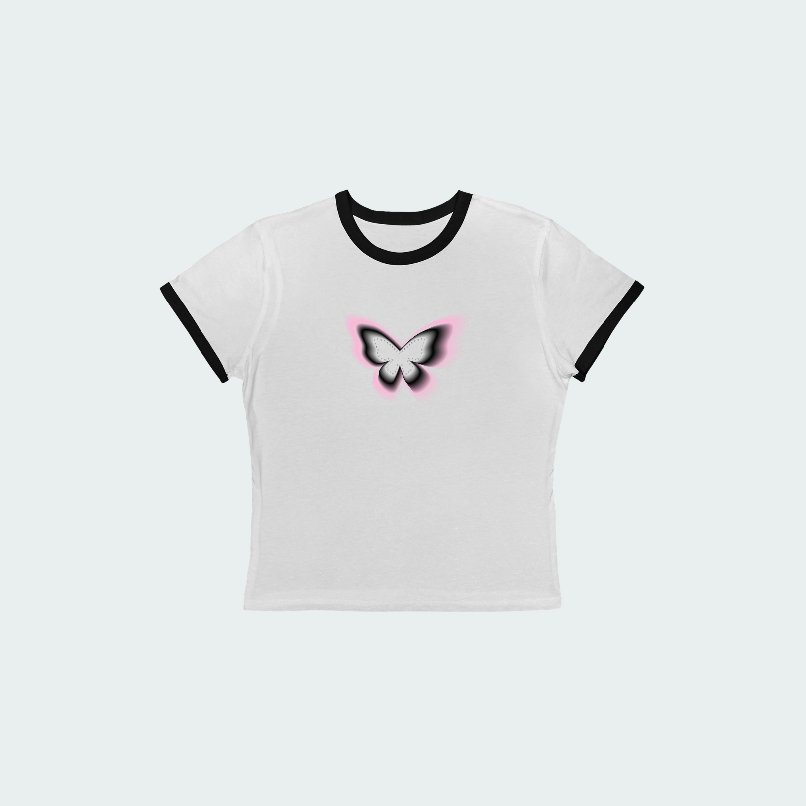 White t-shirt with black ringer sleeves and a butterfly design on a light gray background